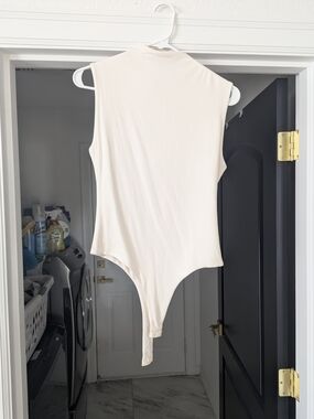 Vici Women's Cream Sleeveless High-Neck  One-Piece Bodysuit